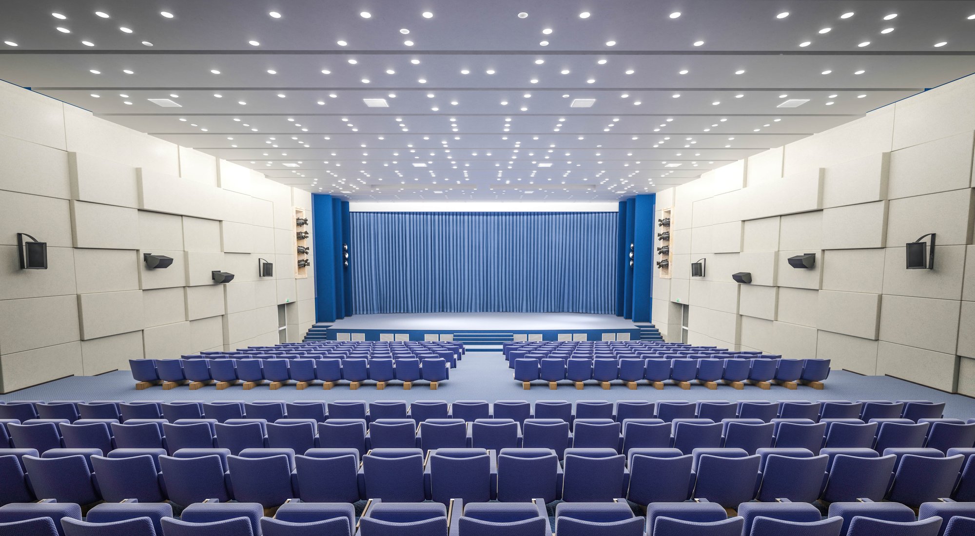 auditorium with blue seats and white walls