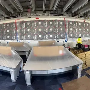 Video wall system wrapped in plastic in the early phases of installation
