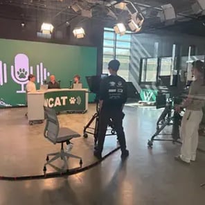 Students filming a broadcast in their new studio in Westminster schools.