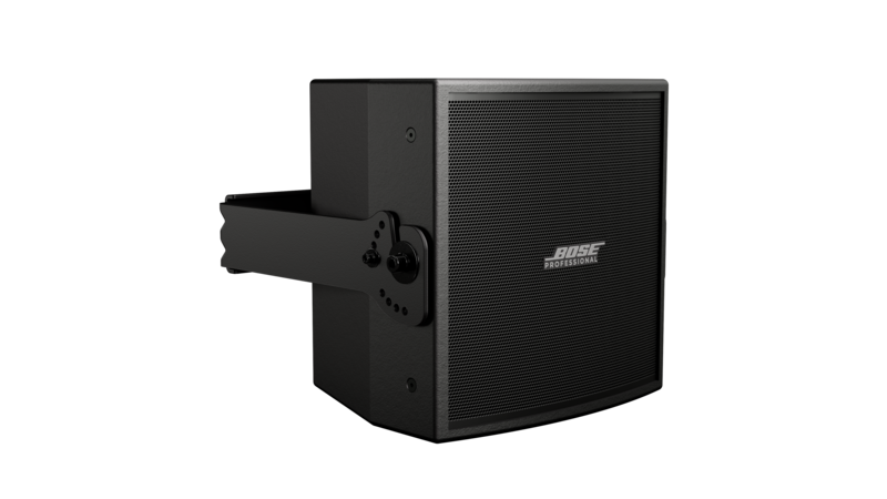 Black Bose Professional wall-mount loudspeaker shown at an angle, featuring a metal grille with logo and an attached mounting bracket against a dark background.