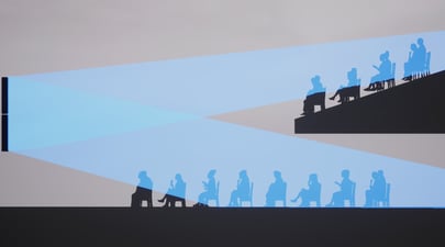 A projector casting wide beams of light onto two tiers of seated audience silhouettes, highlighting viewing angles and sightlines.