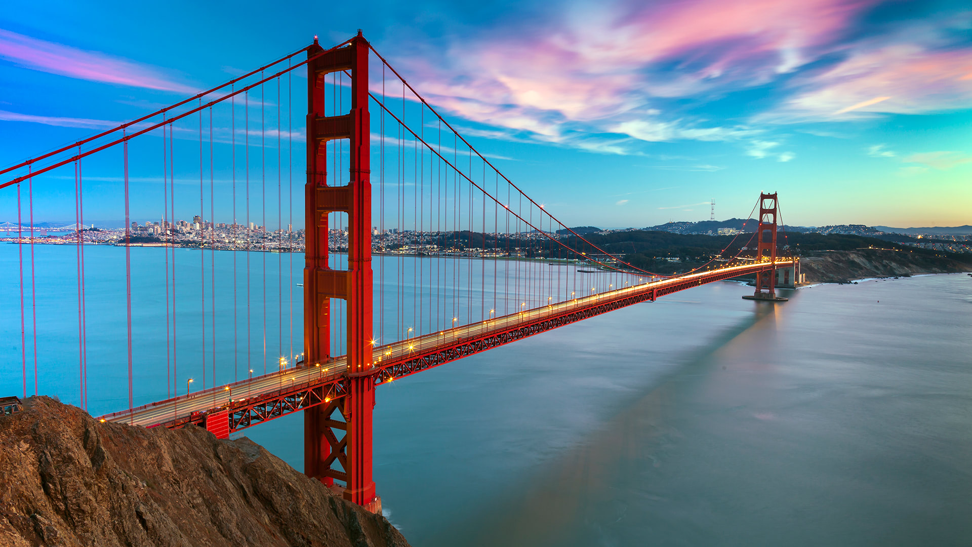 Golden Gate Bridge at sunset with vibrant sky