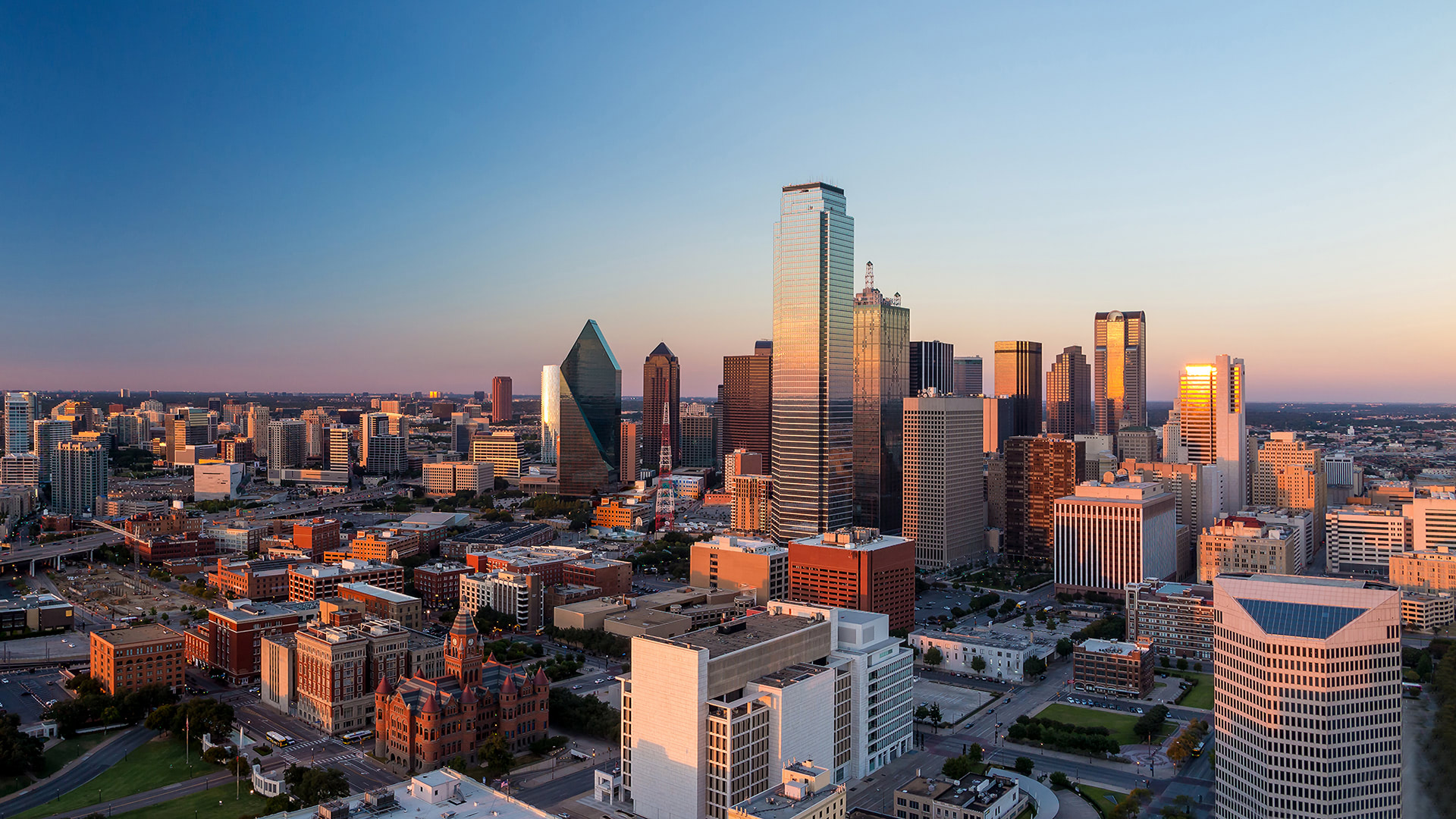 Panoramic view of Dallas, TX skyline at sunset